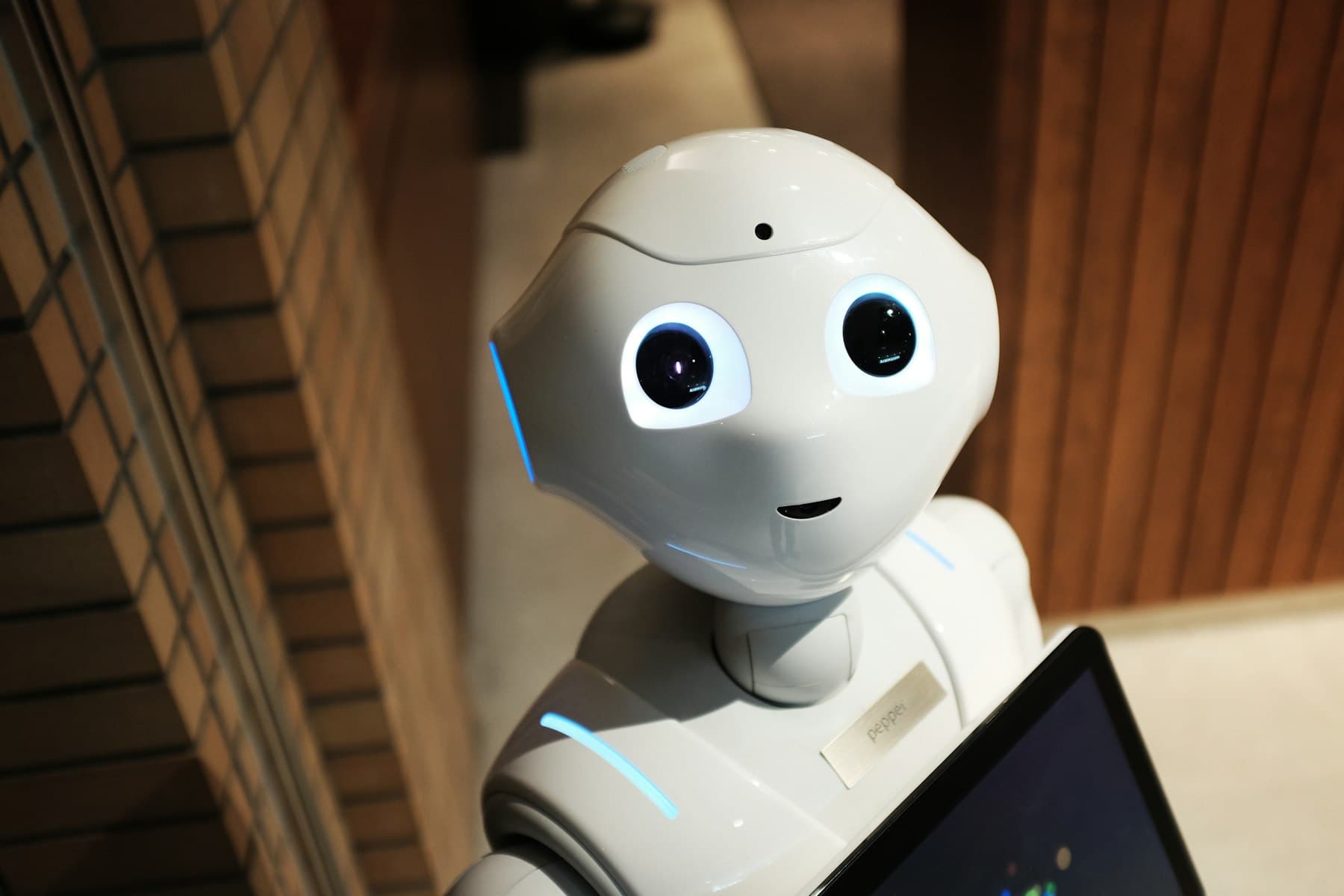 Friendly white humanoid robot, close up